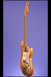 We are very proud to present this custom ordered Paoletti 'Stratospheric Wine Nail Series Millesimata'. This wonderful guitar weighs 9.20 lbs and features a body made from 150-year-old chestnut wine barrels. The body has an oil finish with a thin layer of nitrocellulose, which is enhanced by the placing of 22 brass nails/rivets on the top and 22 brass nails/rivets on the edges. One-piece Honduras mahogany neck with a nut width of just under 1 11/16 inches, a scale length of 25 1/2 inches and a w We are very proud to present this custom ordered Paoletti 'Stratospheric Wine Na